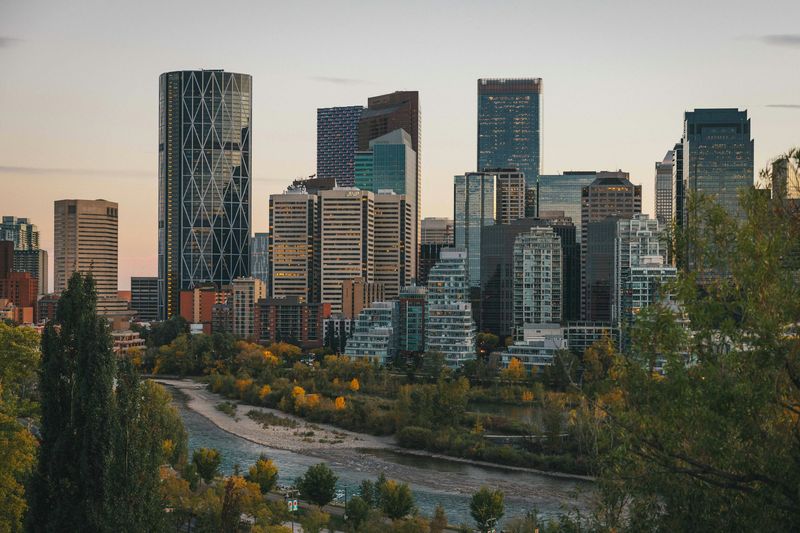 Calgary skyline above a river valley.