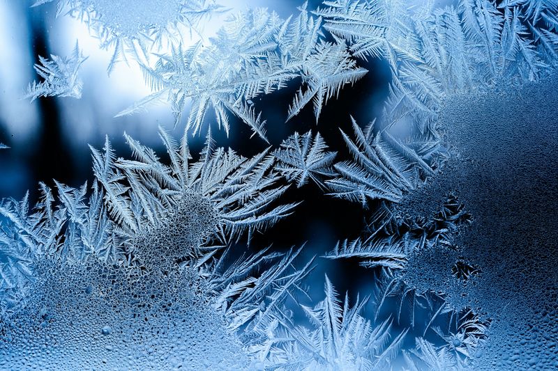 Frost crystals on a window pane.